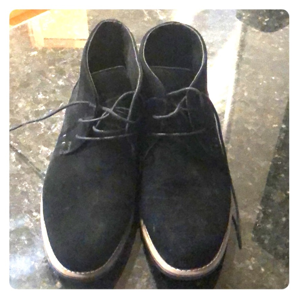 Black and brown men’s chukka boots